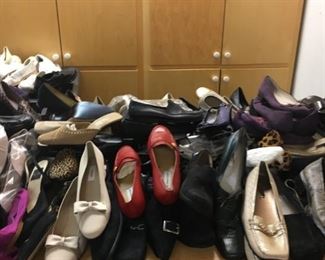 Piles of loafers and business shoes