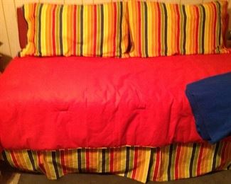 Nice twin size Day bed with bolster pillows and bedding, throw