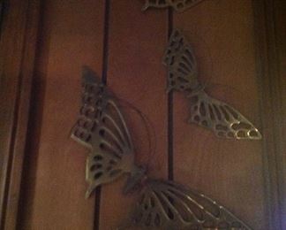 Set of brass butterflies