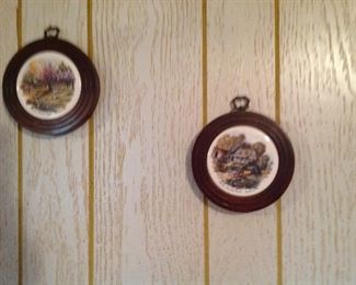 Two of a set of four country scenes plaques