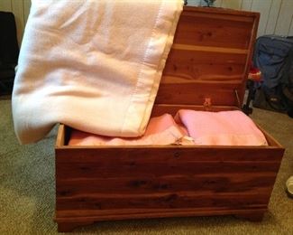 Vintage cedar chest full of vintage blankets