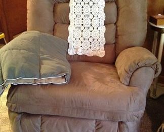 Recliner, croucheted table runner, and throw