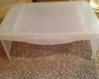 Child's or adult' s tray.  Top comes up for storage.  Could be used for breakfast in bed!!!