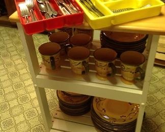 Rolling island, vintage red plastic flatware divider, two sets of stainless steel flatware set of dishes