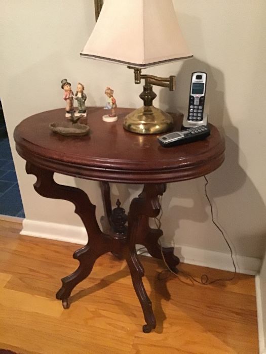 Antique side table, 2 Hummel figurines