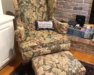 Floral upholstered wing chair and ottoman. Excellent condition.