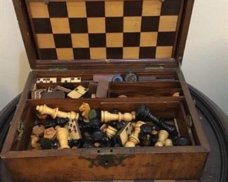 Antique game set and an antique game table.
