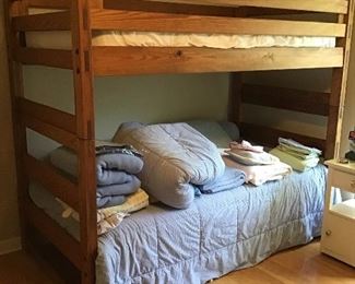 Children’s bunk beds, sold with mattresses.