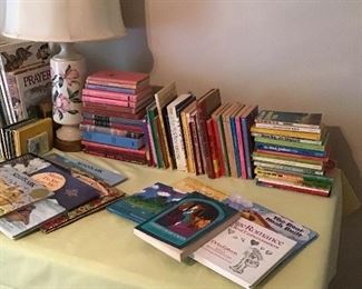 More children’s books and vintage lamp