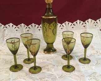 Green Wine Decanter with 6 Glasses https://ctbids.com/#!/description/share/191810