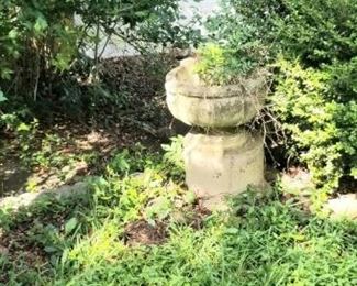 Several larger concrete pots