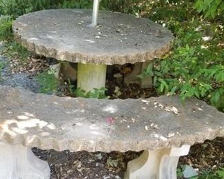 Concrete benches and table, table has crack on top