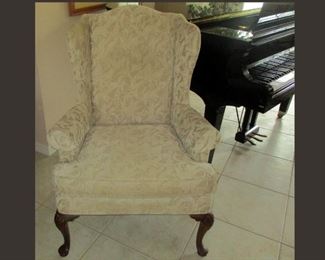 One of a Matching Pair of Attractive Wingback Chairs