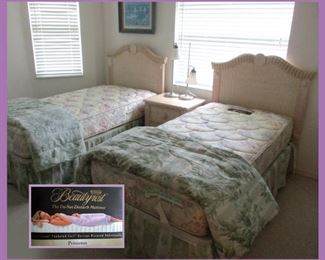 Wicker Pair of Twin Beds, Matching Pair of Wicker Nightstands and there is a Matching Chest of Drawers. Mattresses are Beautyrest