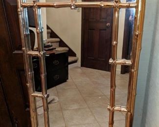 Faux bamboo framed mirror