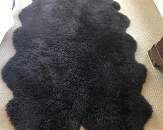 Black sheepskin rug
