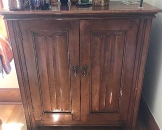 Cabinet with linen fold doors