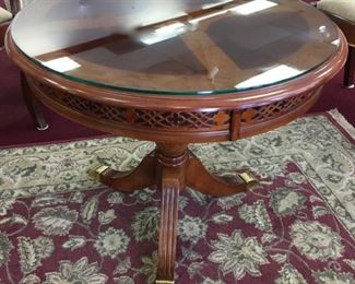 Beautiful round wood carved table with glass top