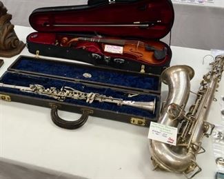 True-Tone Buescher low-pitch silver saxophone, c. 1921-1922, Elkhart, IN. Violin, bow, case, 1/2 size student