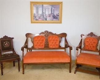 Left To Right:  Antique Carved Wood and Cross Stitch Upholstered Chair On Casters:  $120.00.   Antique Carved Wood European Inspired Settee and Matching Rocker:  $1.200.00