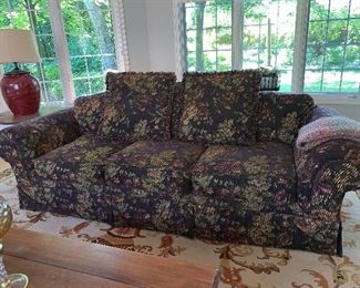 1 of 2 matching floral 3 cushioned Sofa