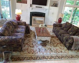  Pair of Couches, coffee table w/matching end table, matching lamps (the rug is not for sale)