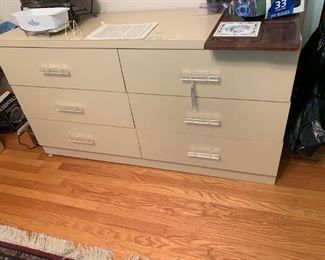 #11		cream laminate 5 drawer chest w clear handles 56x18x30 can be added to #50 shelf for $100	 $75.00 
