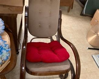 #32		bent wood rocker w tan/brownish cover seat 	 $65.00 
