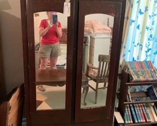 #52		armorie w 2 mirror doors wood w rack 36x18x69	 $75.00 
