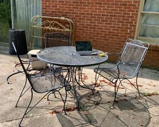 #87		round metal table w 3chairs 	 $60.00 
