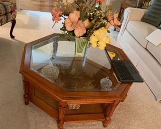 #10 bassett octangle glas top coffee table 38x15 $75.00