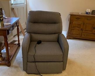 #18		Raffell gray fabric mid centry look electric recliner chair used only a few times 	 $375.00 
