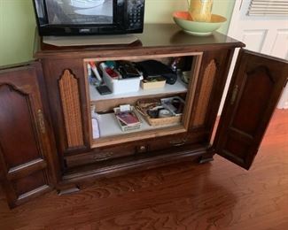 #25 old tv cabinet w folding doors and shelves 45x19x35 $75.00