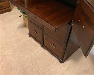 #43		4 drawer wood file drawers and 2 doors w pull out desk 30x19x38	 $125.00 
