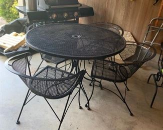 #58		metal table and 4 chairs	 $75.00 
