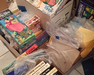 Boxes of paper dolls 