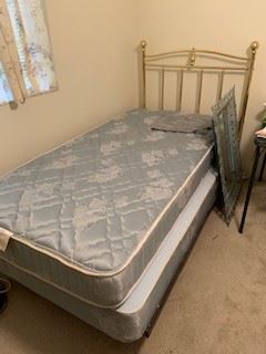Twin metal headboard, box spring, mattress - like new condition