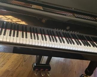 This is a beautiful grand piano 6 feet 11 in. condition excellent