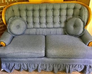 Blue upholstered love seat