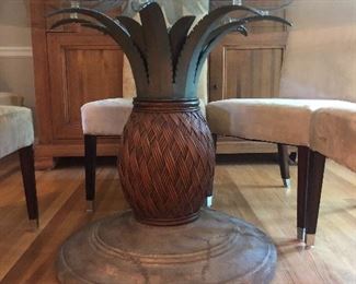 Pineapple base, glass top dining table with 6 chairs. Table measures 54” round. 