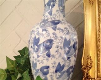One of two blue & white vases