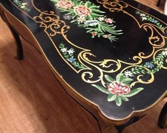 Ornately painted coffee table