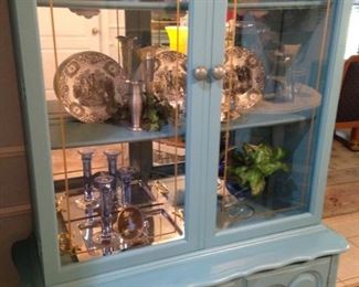 Glass front china cabinet with upper display and  lower storage