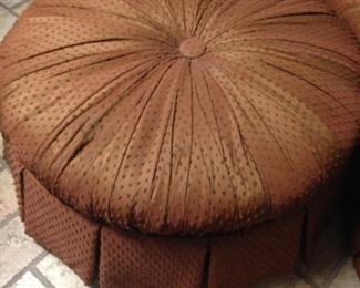 Beautifully upholstered round ottoman