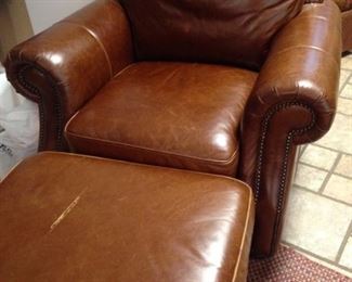 Brown leather chair and ottoman (ottoman -as is)