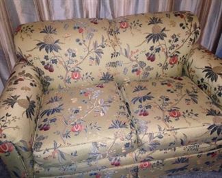 Pale yellow print love seat