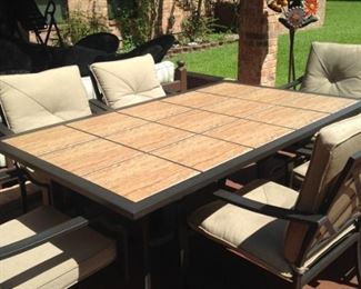 Patio  table (with tile top) and 6 chairs
