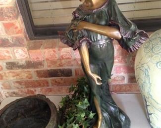 Cast iron lady statue