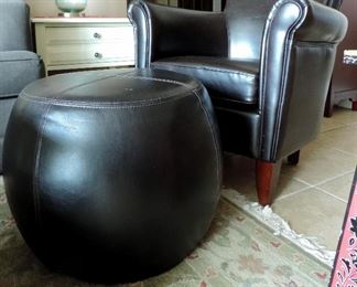 LEATHER ARMCHAIR AND ROUND OTTOMAN