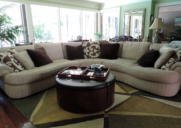 CUSTOM MID CENTURY STYLE SOFA AND PILLOWS, ROUND LEATHER COFFEE TABLE